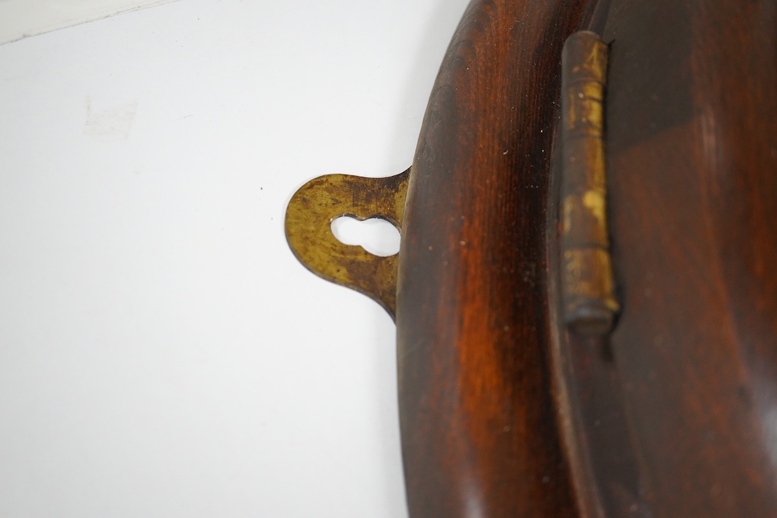 A large 20th century wall clock with platform escapement, the dial painted with GWR, 68cm in diameter